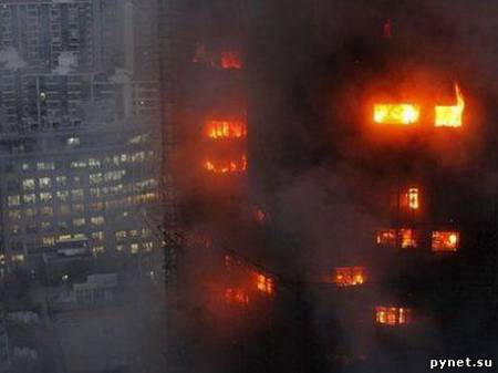 Число жертв пожара в шанхайском небоскребе увеличилось до 49 человек. Изображение 1